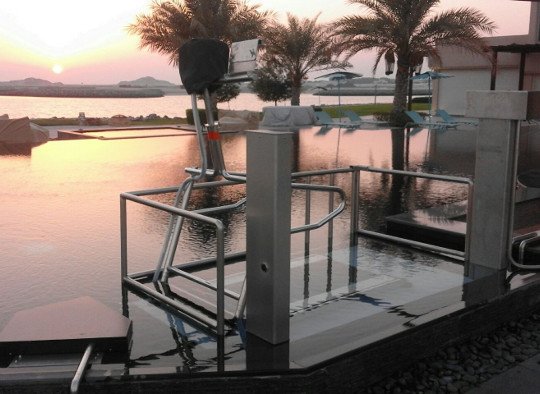 Underwater treadmill lifting system