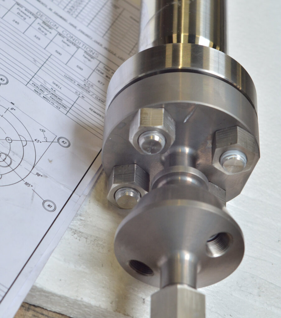 A machined stainless steel flange on its approved design drawing